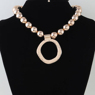 Gilded Grace Loop Necklace in Gold